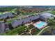 Community clubhouse with pool, landscaping, and surrounding neighborhood at 4152 Aberdeen Ln, Lake Wales, FL 33859