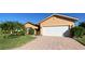 Single-Gathering home with two-car garage and landscaped yard at 4152 Aberdeen Ln, Lake Wales, FL 33859