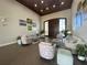Elegant community clubhouse lobby with comfortable seating and large doors at 4152 Aberdeen Ln, Lake Wales, FL 33859