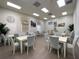 Bright community dining room with multiple tables and chairs at 4152 Aberdeen Ln, Lake Wales, FL 33859