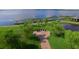 Serene memorial garden with flagpole and brick pathway at 4152 Aberdeen Ln, Lake Wales, FL 33859