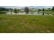 Property backs up to a tranquil pond with a scenic view at 535 Noble Ave, Davenport, FL 33837