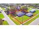 Aerial view of a single-Gathering home and detached building on a large lot at 738 Strain Blvd, Lakeland, FL 33815