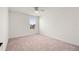 Bright bedroom with carpeted floor and a ceiling fan at 9660 Westside Hills Dr, Davenport, FL 33896