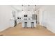 Modern kitchen with white cabinets and island at 9660 Westside Hills Dr, Davenport, FL 33896