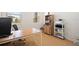 Bright home office featuring a desk, bookcase, and printer at 9660 Westside Hills Dr, Davenport, FL 33896