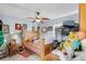 Small bedroom with a twin bed and ceiling fan at 1028 Dampierre Ct, Kissimmee, FL 34759