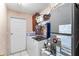 Laundry room with washer, dryer, and storage at 1028 Dampierre Ct, Kissimmee, FL 34759