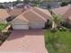 Attractive villa with 2-car garage, and nicely landscaped grounds at 1644 Linz Ct, Winter Haven, FL 33884
