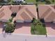 Aerial view of multiple villas with attractive roofing and landscaping at 1644 Linz Ct, Winter Haven, FL 33884