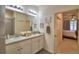 Bathroom boasts double sinks, granite countertop and shower at 1644 Linz Ct, Winter Haven, FL 33884