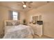 Bedroom with a queen bed, dresser, and TV at 1644 Linz Ct, Winter Haven, FL 33884