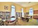 Well-lit community library with bookshelves and comfortable seating at 1644 Linz Ct, Winter Haven, FL 33884