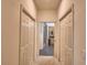 Hallway with two closets and access to bathroom at 1644 Linz Ct, Winter Haven, FL 33884