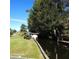 Peaceful waterfront lot with canal access and lush landscaping at 175 Bonnie Dr, Auburndale, FL 33823