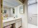Bathroom with single vanity and mirrored medicine cabinet at 18 Coventry Dr, Haines City, FL 33844