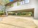 Covered carport offering parking and shade at 18 Coventry Dr, Haines City, FL 33844