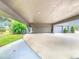 Covered carport with double garage doors at 18 Coventry Dr, Haines City, FL 33844