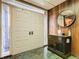 Entryway with double doors and a dark wood console table at 18 Coventry Dr, Haines City, FL 33844