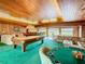 Game room with pool table, card table, and seating area at 18 Coventry Dr, Haines City, FL 33844