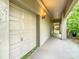 Garage entry with walkway and additional storage at 18 Coventry Dr, Haines City, FL 33844