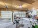 Garage with double doors and overhead storage at 18 Coventry Dr, Haines City, FL 33844