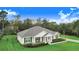 Single story home with large yard and driveway at 2997 Sequoyah Dr, Haines City, FL 33844