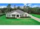Beautiful home with a large yard and driveway at 2997 Sequoyah Dr, Haines City, FL 33844