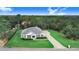 Aerial view of a single-Gathering home with a large yard at 2997 Sequoyah Dr, Haines City, FL 33844