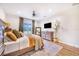 Bright bedroom with king-size bed and wood dresser at 2997 Sequoyah Dr, Haines City, FL 33844