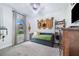 Cozy bedroom with daybed, window, and ample closet space at 2997 Sequoyah Dr, Haines City, FL 33844