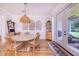 Dining area with round table and woven chairs, near kitchen at 2997 Sequoyah Dr, Haines City, FL 33844