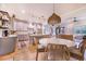 Open concept kitchen with island and dining area at 2997 Sequoyah Dr, Haines City, FL 33844