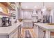 Modern kitchen with gray cabinets and white quartz countertops at 2997 Sequoyah Dr, Haines City, FL 33844