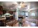 Kitchen with stainless steel appliances and dark wood cabinets at 302 E Palm St, Davenport, FL 33837