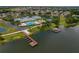 Aerial view of community amenities including pool and lake access at 3309 Raleigh Dr, Winter Haven, FL 33884