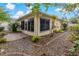 Landscaped backyard with patio and privacy fence at 3309 Raleigh Dr, Winter Haven, FL 33884