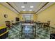 Bright community room with tables and chairs at 3309 Raleigh Dr, Winter Haven, FL 33884
