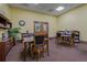 Game room with tables and chairs, and ample board games at 3309 Raleigh Dr, Winter Haven, FL 33884