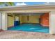 Spacious garage with painted floor and ample storage at 3309 Raleigh Dr, Winter Haven, FL 33884