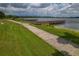 Peaceful lakeside walkway with access to multiple docks at 3309 Raleigh Dr, Winter Haven, FL 33884