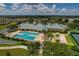 Community pool, spa, and surrounding lounge area at 3309 Raleigh Dr, Winter Haven, FL 33884