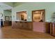 Community reception area with wood details and flooring at 3309 Raleigh Dr, Winter Haven, FL 33884