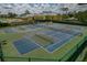 Well-maintained tennis and pickleball courts at 3309 Raleigh Dr, Winter Haven, FL 33884