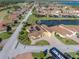 Aerial view of single-Gathering home with pool and solar panels at 3604 Blackmoor Ln, Lake Wales, FL 33859