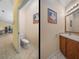 Guest bathroom with toilet and vanity at 3604 Blackmoor Ln, Lake Wales, FL 33859