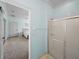 Ensuite bathroom with shower and view of bedroom at 3604 Blackmoor Ln, Lake Wales, FL 33859