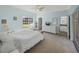 Bright bedroom with a queen bed and ensuite bathroom at 3604 Blackmoor Ln, Lake Wales, FL 33859