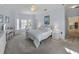 Spacious bedroom with carpeted floor, a ceiling fan, and ample natural light at 3604 Blackmoor Ln, Lake Wales, FL 33859