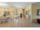 Light and airy entryway, tile floors, double doors to backyard, and access to other rooms at 3604 Blackmoor Ln, Lake Wales, FL 33859